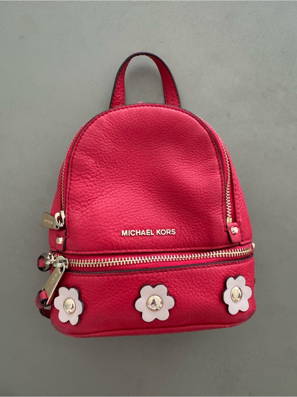 Michael Kors Bright red Mini Backpack with White Flower Accents